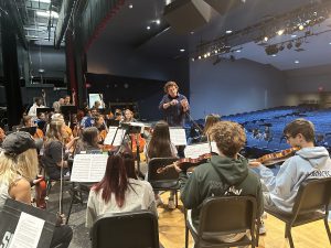 Composer Jim Papoulis with SHS students