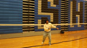 student playing badminton