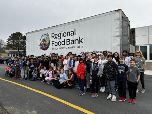 image of latham ridge students in front of regional food bank truck