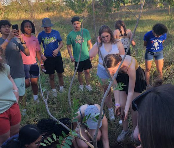 SHS students planting tree in rainforest in Costa Rica