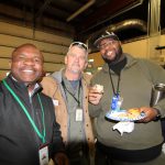 members of the transportation team socialize on Bus Driver Appreciation Day