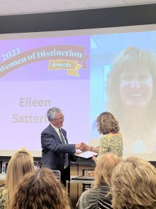 Satterlee is congratulated by New York state Assemblyman Phil Steck