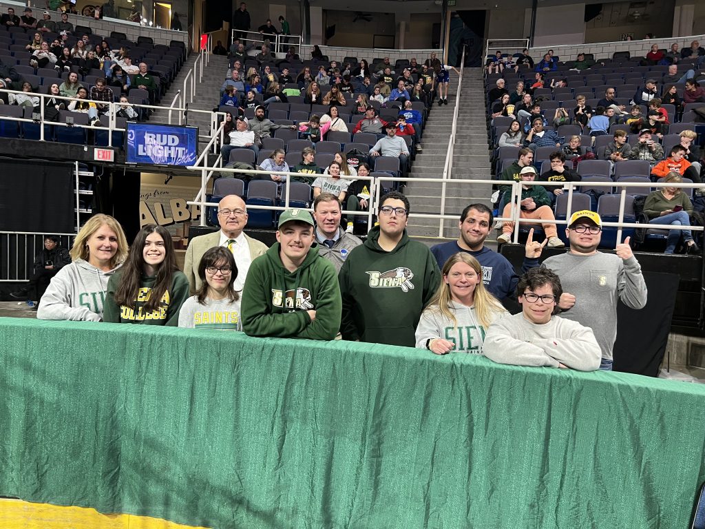Shaker-Siena transition students are honored at a Siena game.