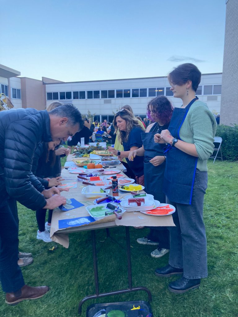 An image of Shaker Principal Marcus Puccioni trying his hand at leaf painting.