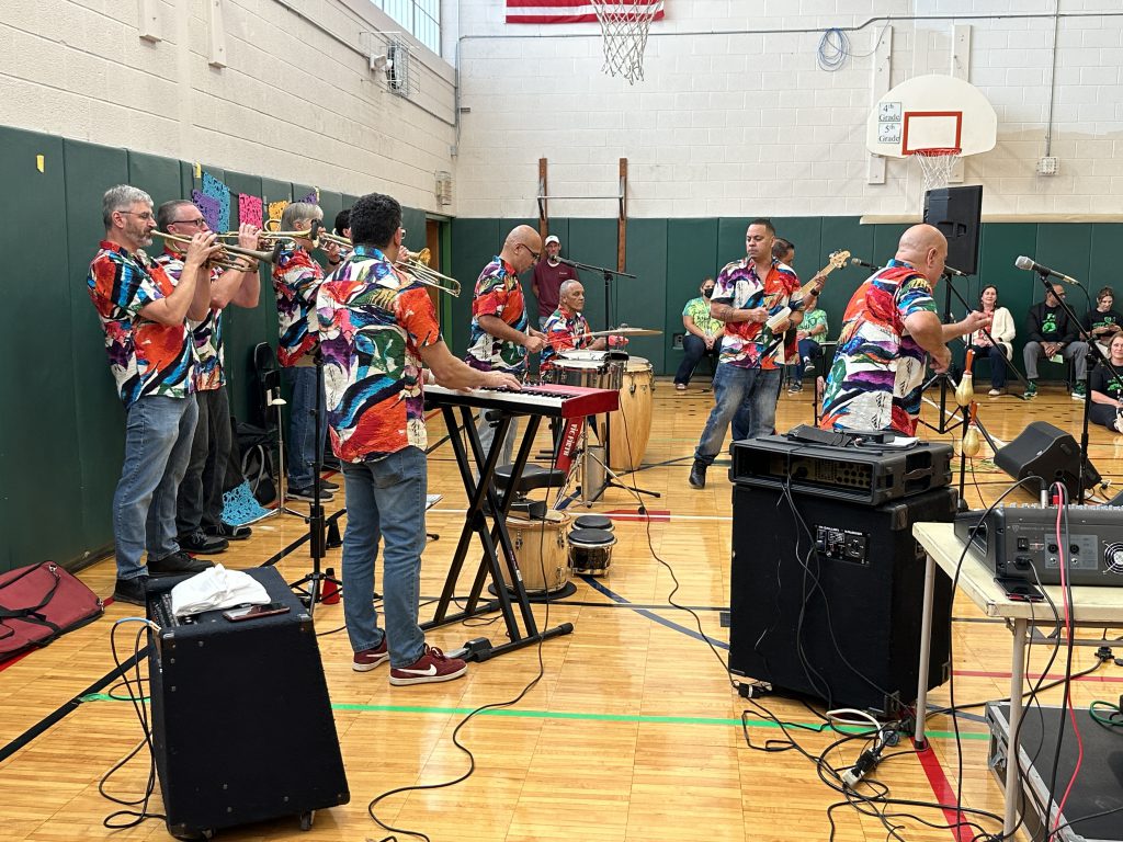 An image of Alex Torres & His Latin Orchestra playing music.