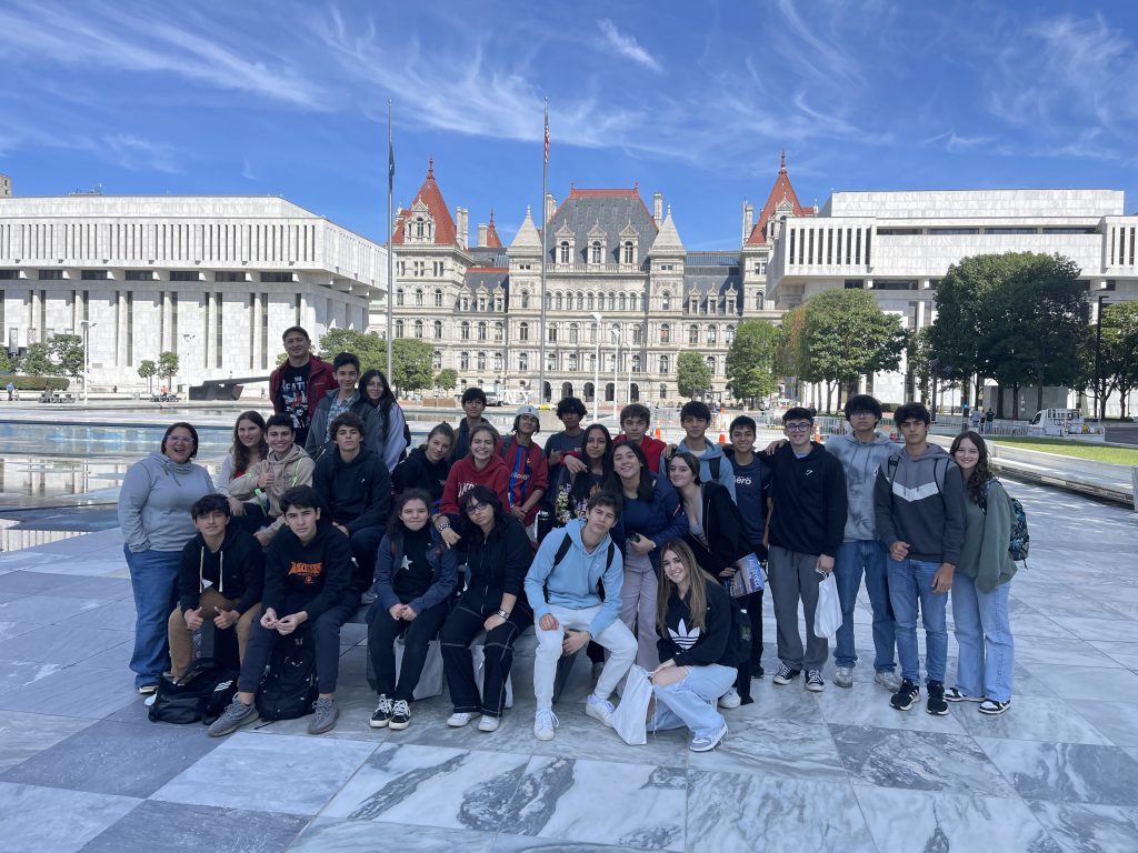 An image of a group of students in front of the Capitol building in Albany.