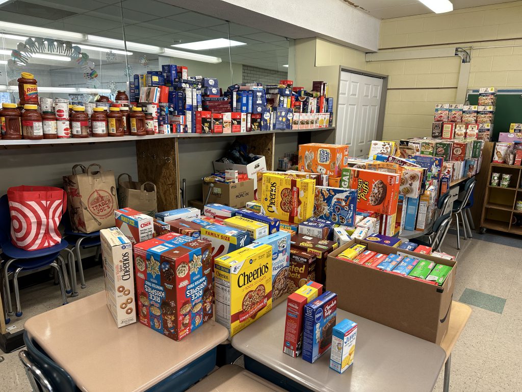 An image of hundreds of non-perishable food items donated to the Southgate food pantry.