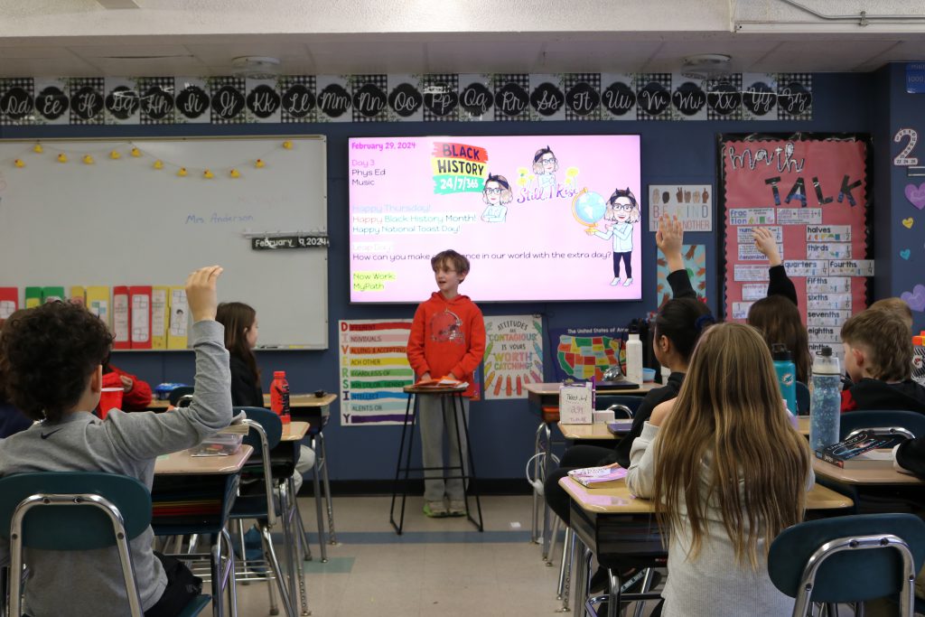 Southgate student presents Black History Month research project in Ms. Fulmore's fourth grade class.
