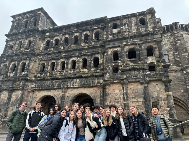 An image of a group of students posing in front of a building in Germany.