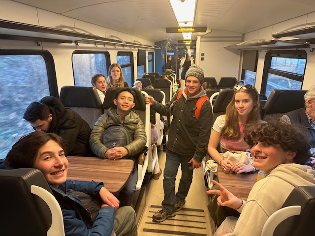 An image of students on the train.