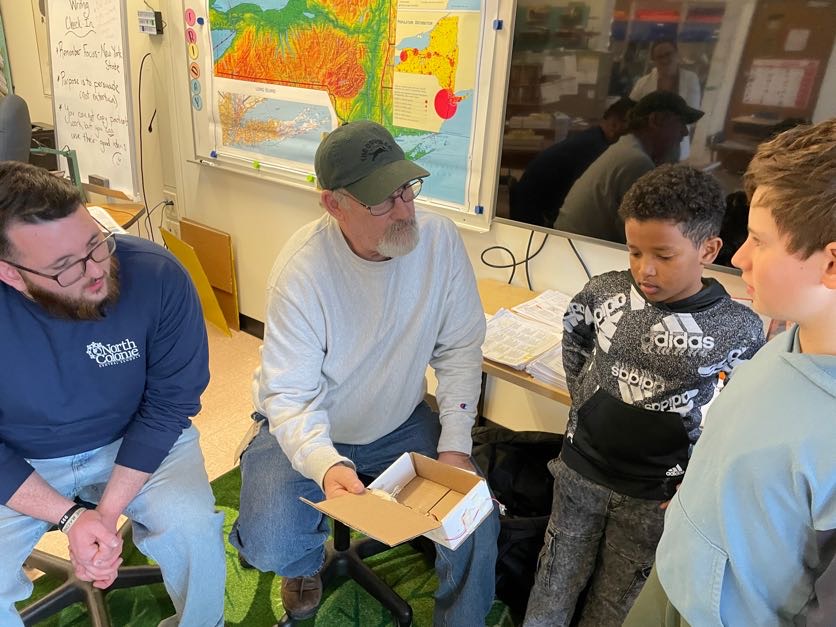 NCCSD Electrician Rick Doty with LO students and their curcuit projects.