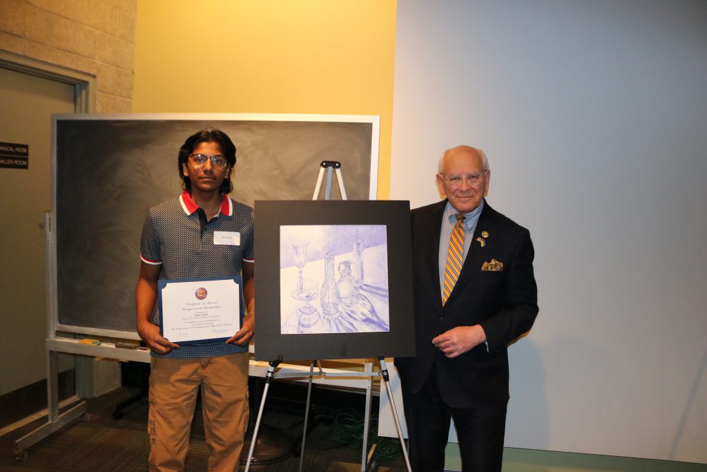 An image of 20th Congressional District Art Competition winner Hans Gupta with Congressman Paul Tonko.